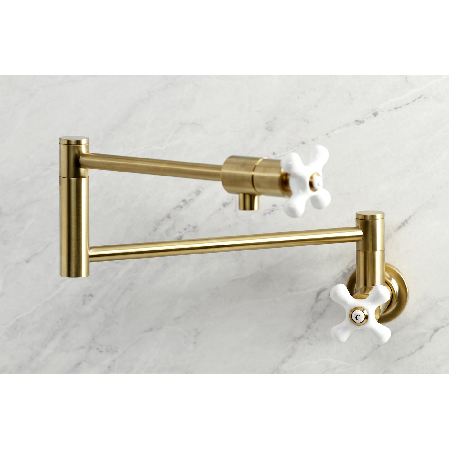 Kingston Brass KS4107PX Metropolitan Wall Mount Pot Filler Faucet, Brushed Brass close-up image with swing arms