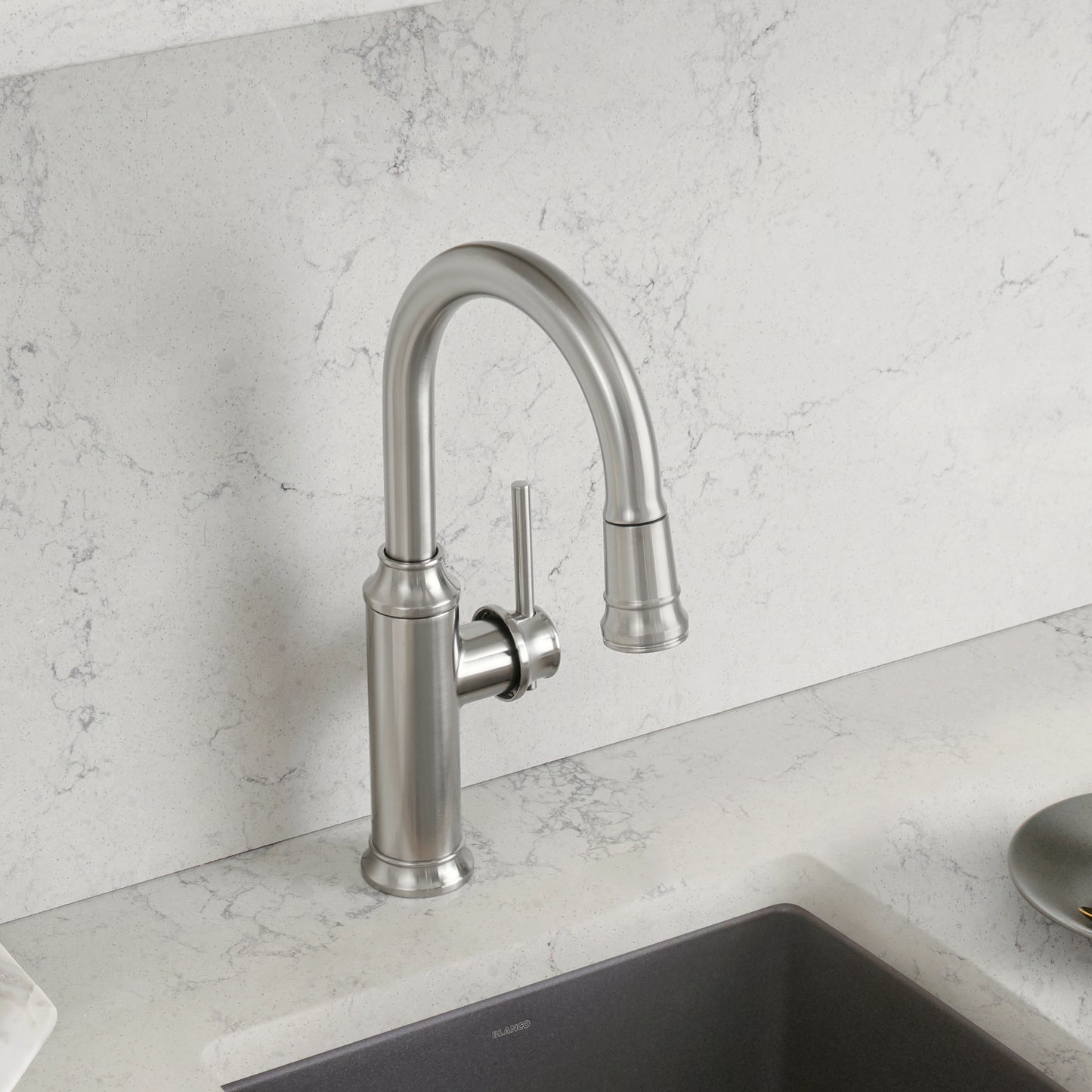 BLANCO Empressa Pull-Down Bar Faucet with vintage wine press design in a modern kitchen.