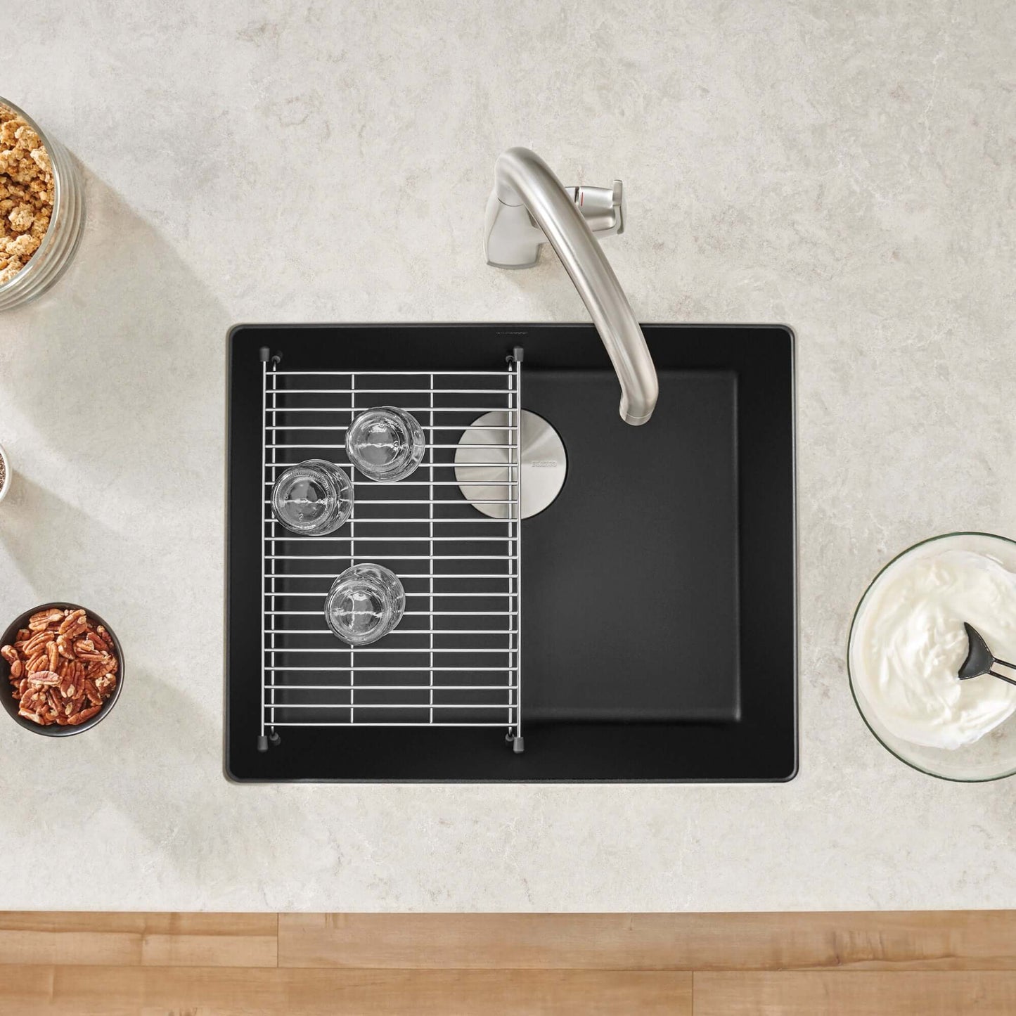 BLANCO Precis SILGRANIT 21" Single Bowl Undermount Kitchen Sink with grid and glasses on countertop