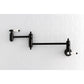 Kingston Brass KS3103BPL Bel-Air Wall Mount Pot Filler Faucet, Antique Brass on a white tiled wall.