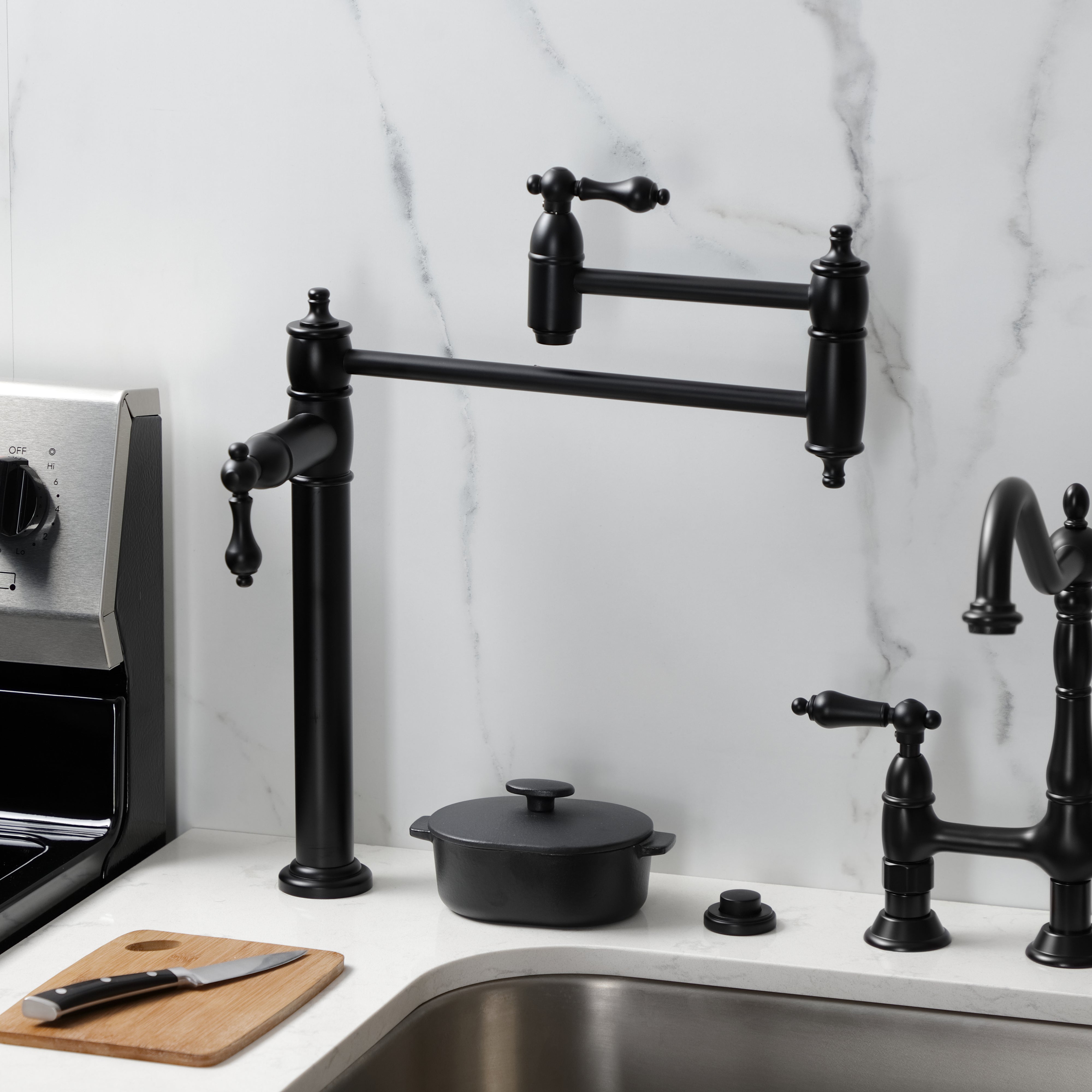 Kingston Brass KS3703AL Restoration Deck Mount Pot Filler Faucet, Antique Brass in a modern kitchen setting.