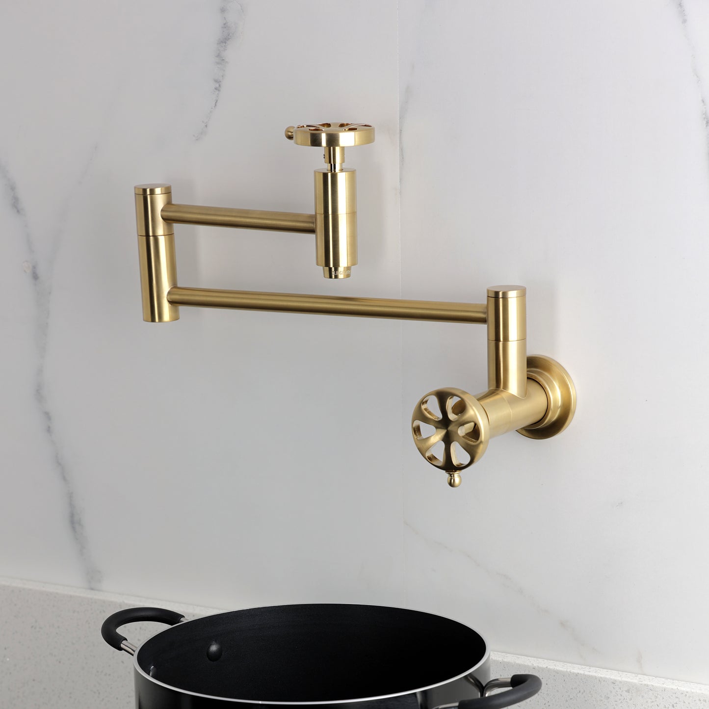 Kingston Brass KS8103RX Belknap Wall Mount Pot Filler Faucet, Antique Brass design with foldable swing arms.