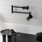 Kingston Brass KS4103RX Belknap Wall Mount Pot Filler Faucet, Antique Brass installed in kitchen