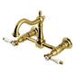 Kingston KS1263BPL Bel-Air Two-Handle Wall Mount Bridge Kitchen Faucet, Antique Brass with white porcelain levers.