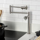 Kingston Brass KS4703CG Fuller Deck Mount Pot Filler Faucet, Antique Brass in a modern kitchen setting.