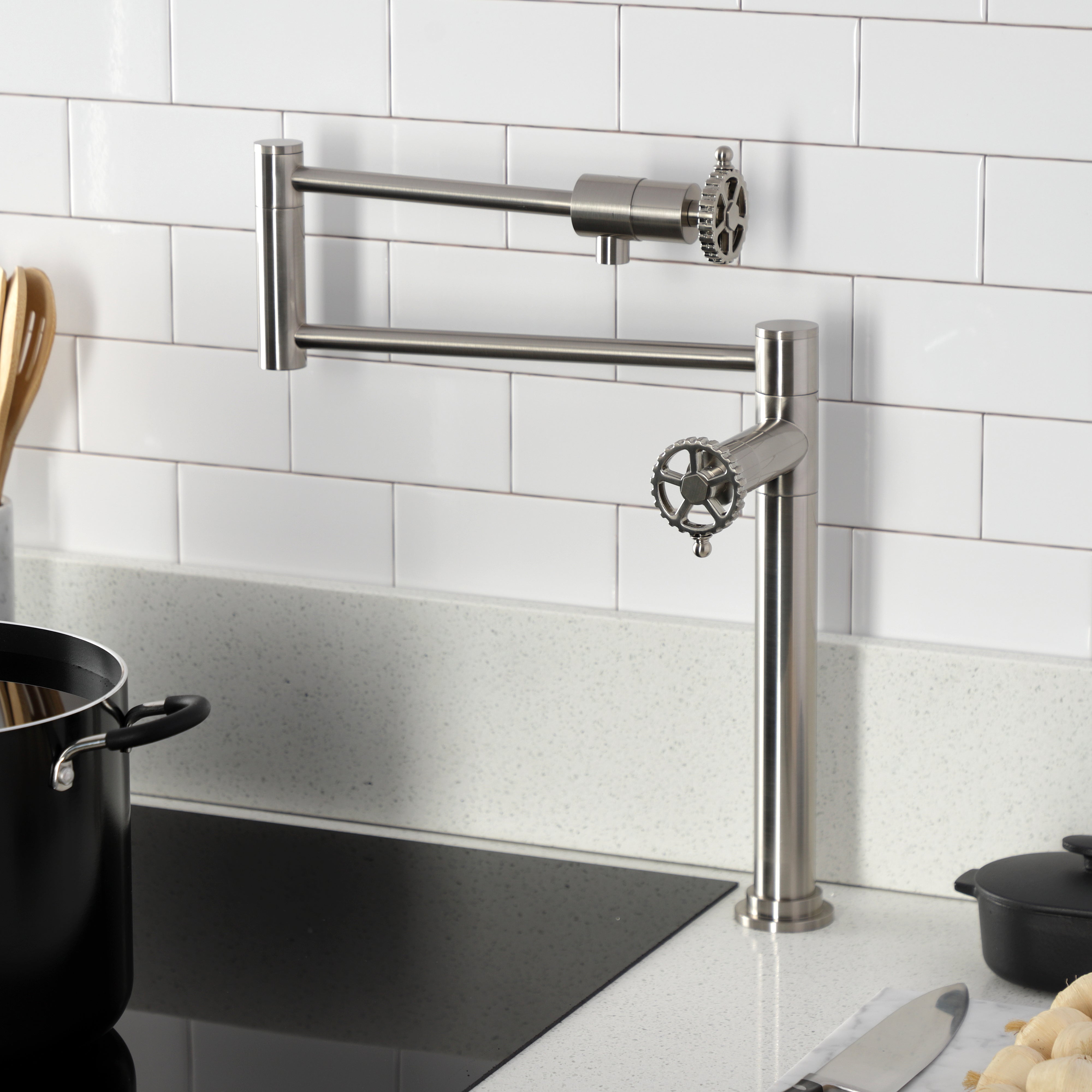 Kingston Brass KS4703CG Fuller Deck Mount Pot Filler Faucet, Antique Brass in a modern kitchen setting.