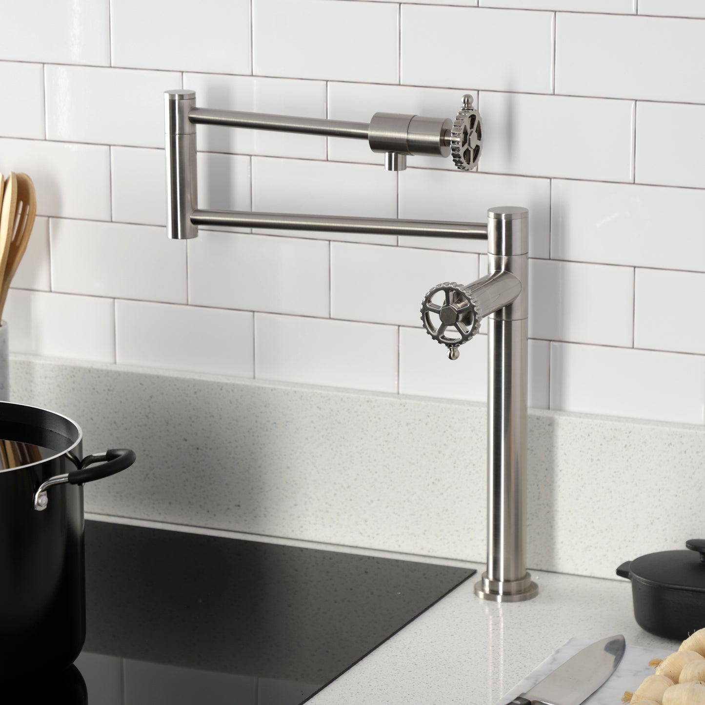 Kingston Brass KS4703CG Fuller Deck Mount Pot Filler Faucet, Antique Brass in a modern kitchen setting.