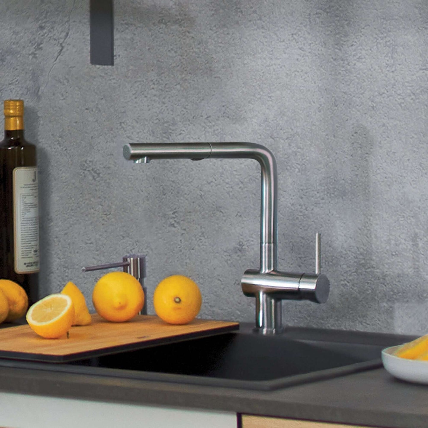 BLANCO Linus Low Arc Pull-Out Dual-Spray Kitchen Faucet - in a modern kitchen with lemons