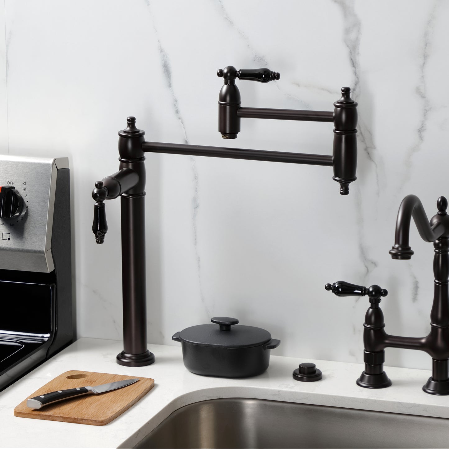 Kingston Brass KS3707PKL Duchess Deck Mount Pot Filler Faucet, Brushed Brass in a modern kitchen setting.