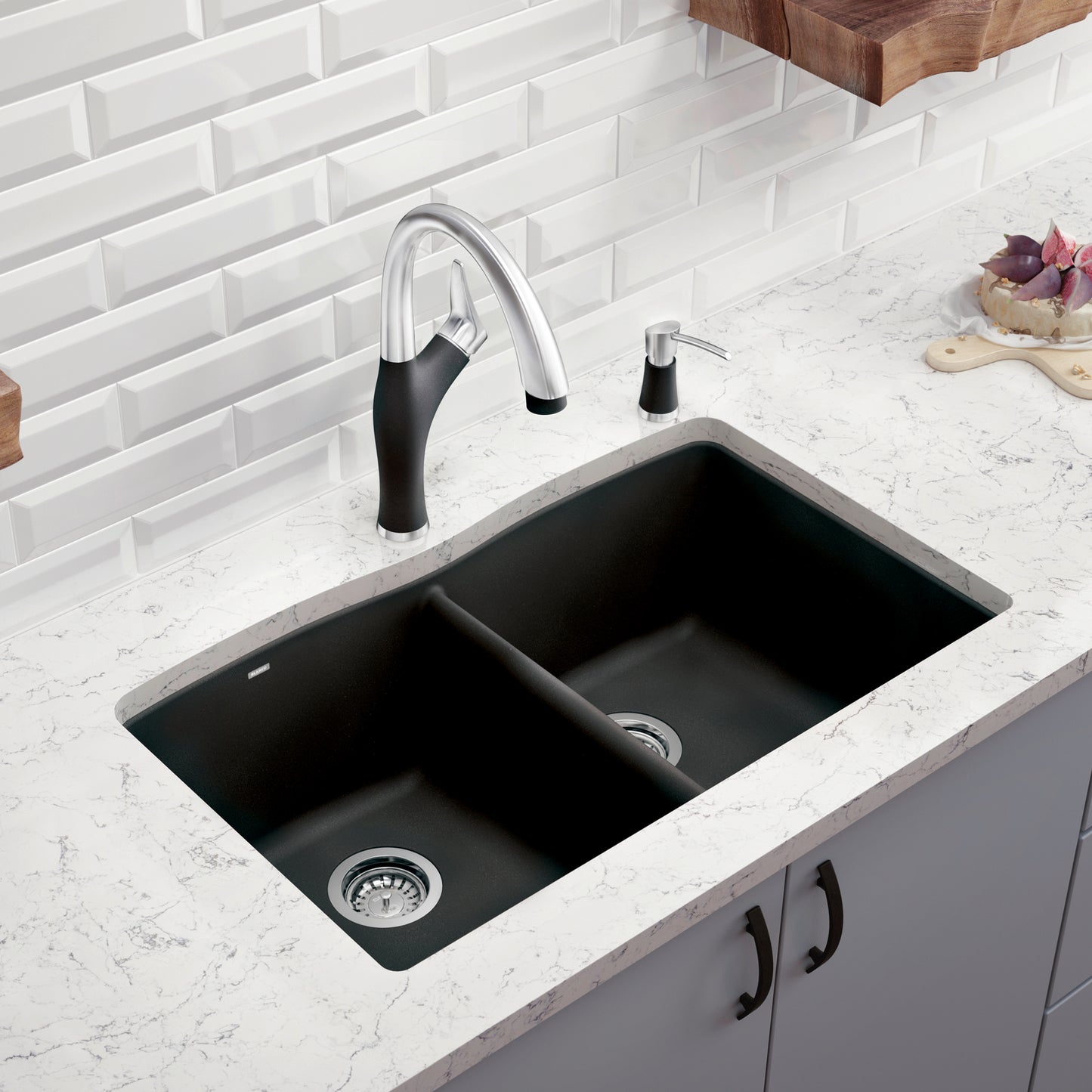 BLANCO Diamond SILGRANIT 33" 50/50 Double Bowl Dual Mount Kitchen Sink shown in modern kitchen with elegant faucet.