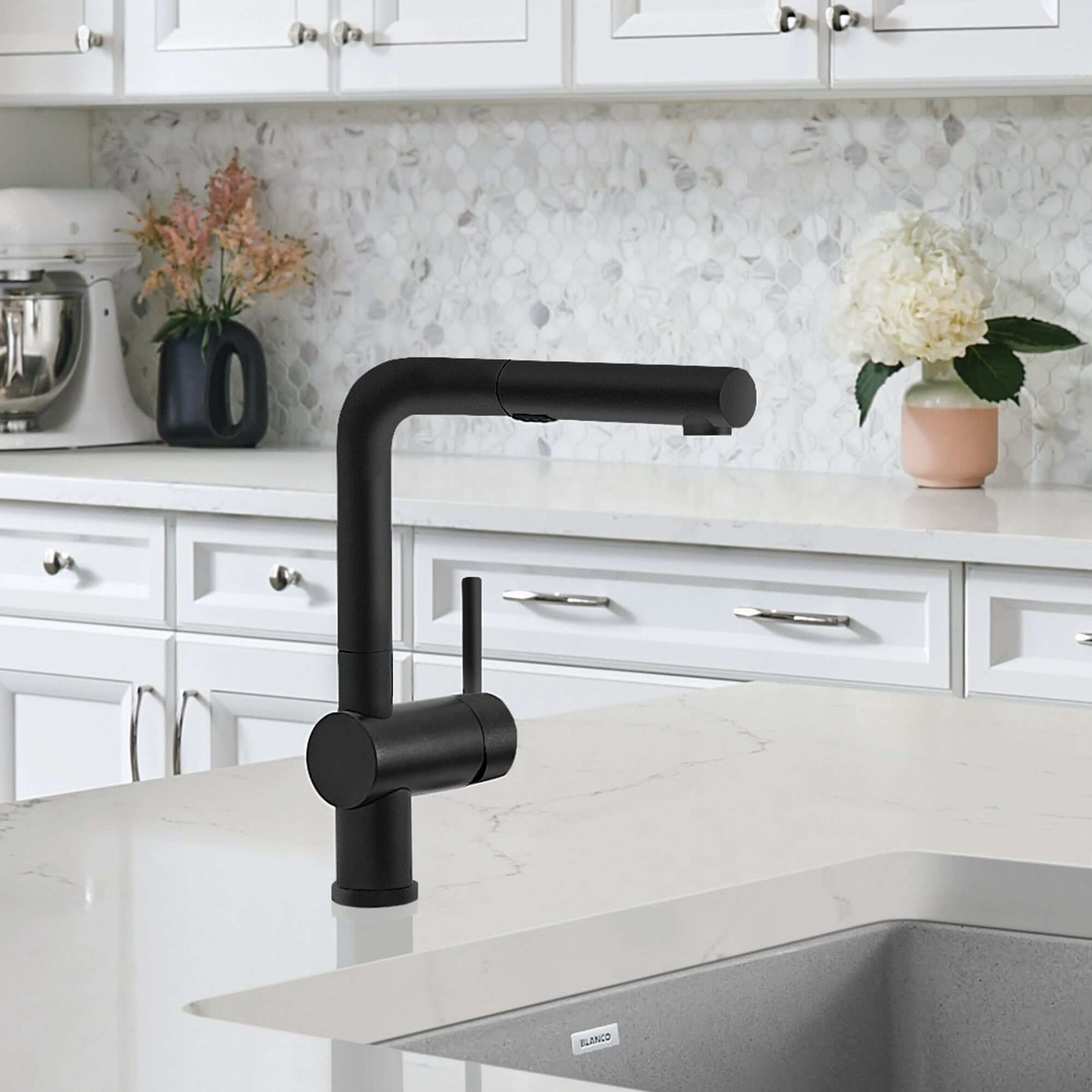 BLANCO Linus Low Arc Pull-Out Dual-Spray Kitchen Faucet - Anthracite in modern kitchen setting with white cabinetry.