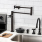 Kingston Brass KS4705BEX Essex Deck Mount Pot Filler Faucet, Oil Rubbed Bronze displayed in a modern kitchen.