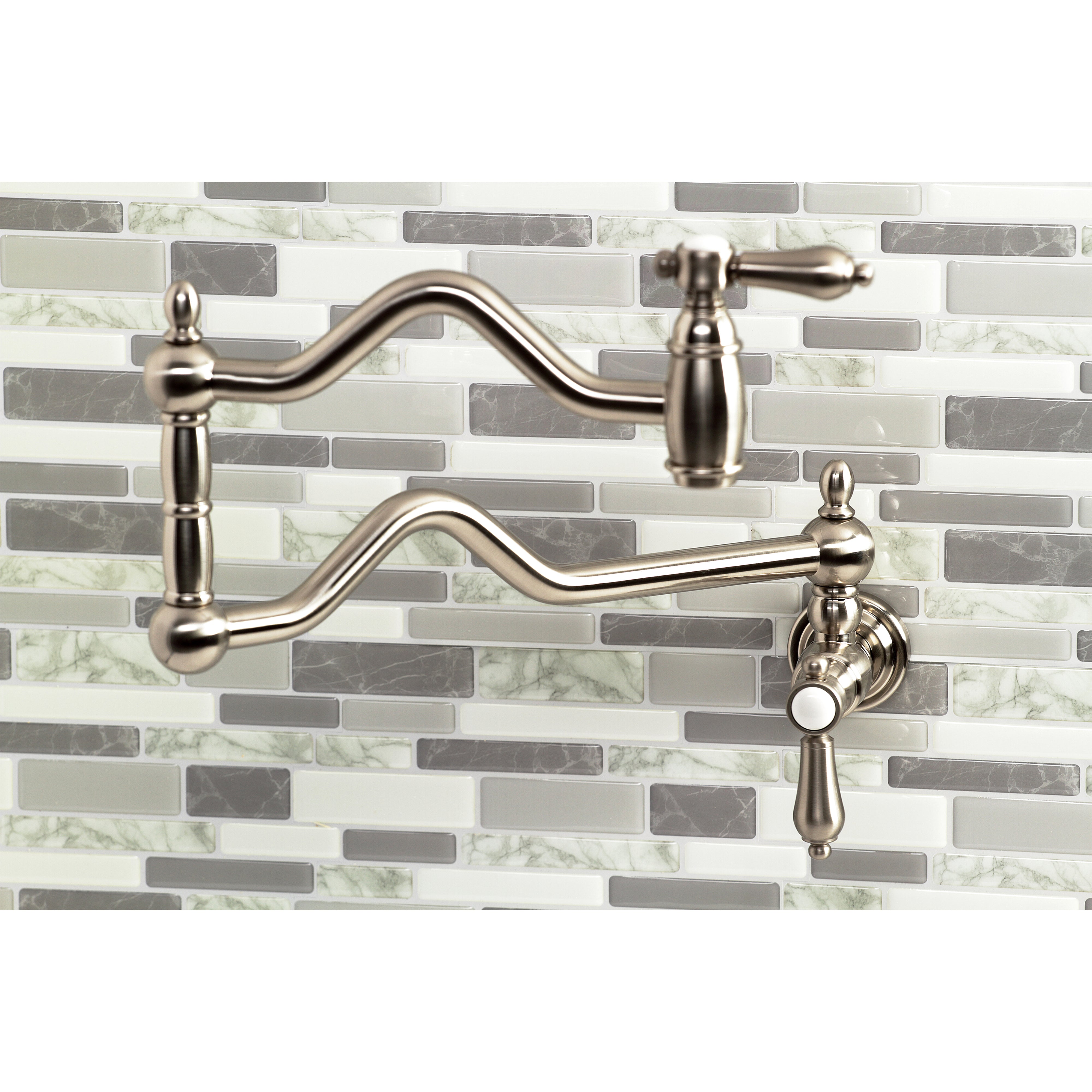 Kingston Brass KS2107BAL Heirloom Wall Mount Pot Filler Faucet, Brushed Brass mounted on mosaic tile backsplash