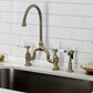 Kingston KS7793BPLBS Bel-Air Bridge Kitchen Faucet with Brass Sprayer, Antique Brass in a kitchen setting.