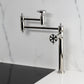 Kingston Brass KS3703RX Belknap Deck Mount Pot Filler Faucet, Antique Brass image showcasing foldable swing arms and elegant design.