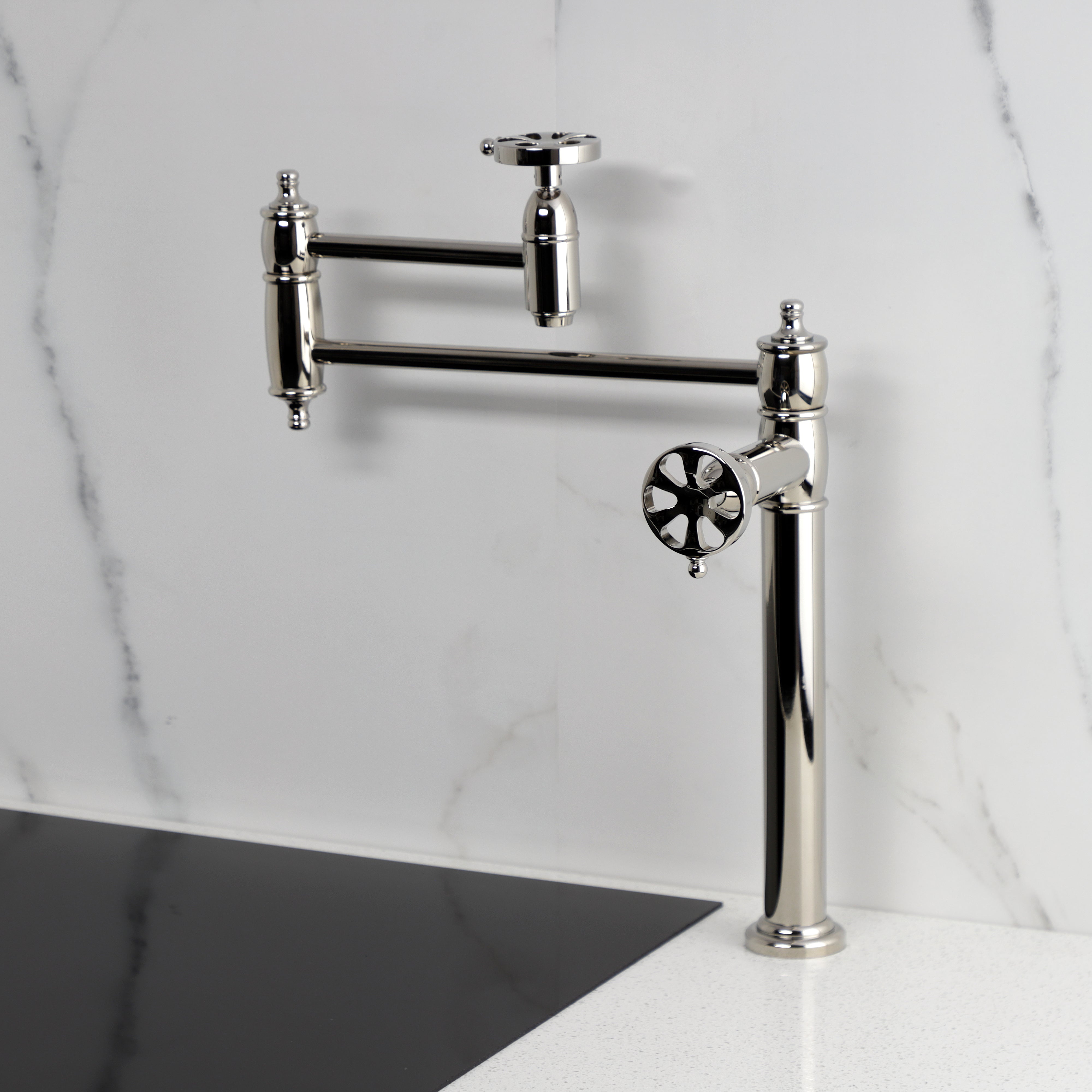 Kingston Brass KS3703RX Belknap Deck Mount Pot Filler Faucet, Antique Brass image showcasing foldable swing arms and elegant design.