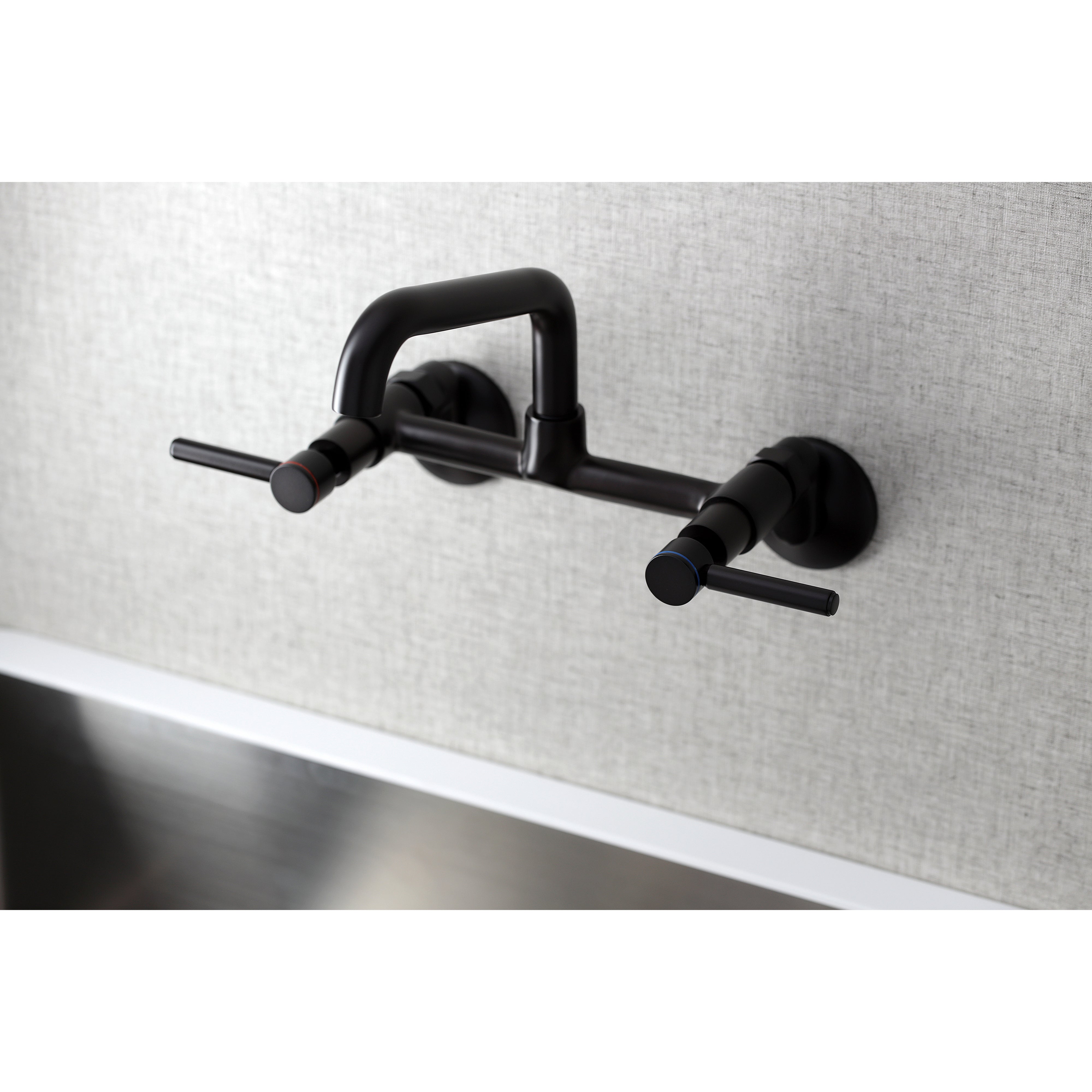 Kingston Brass KS823SB Concord Wall Mount Bridge Kitchen Faucet with modern design and solid brass construction
