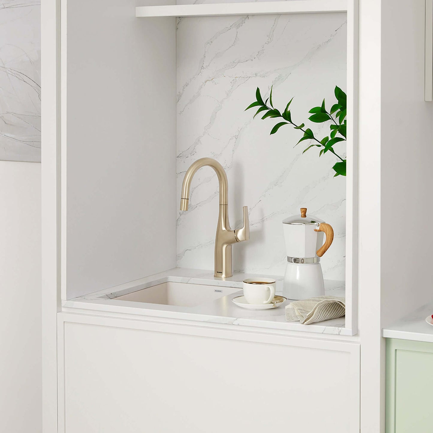 Stylish kitchen setup featuring BLANCO Precis SILGRANIT 13" Undermount Bar Sink with modern faucet.