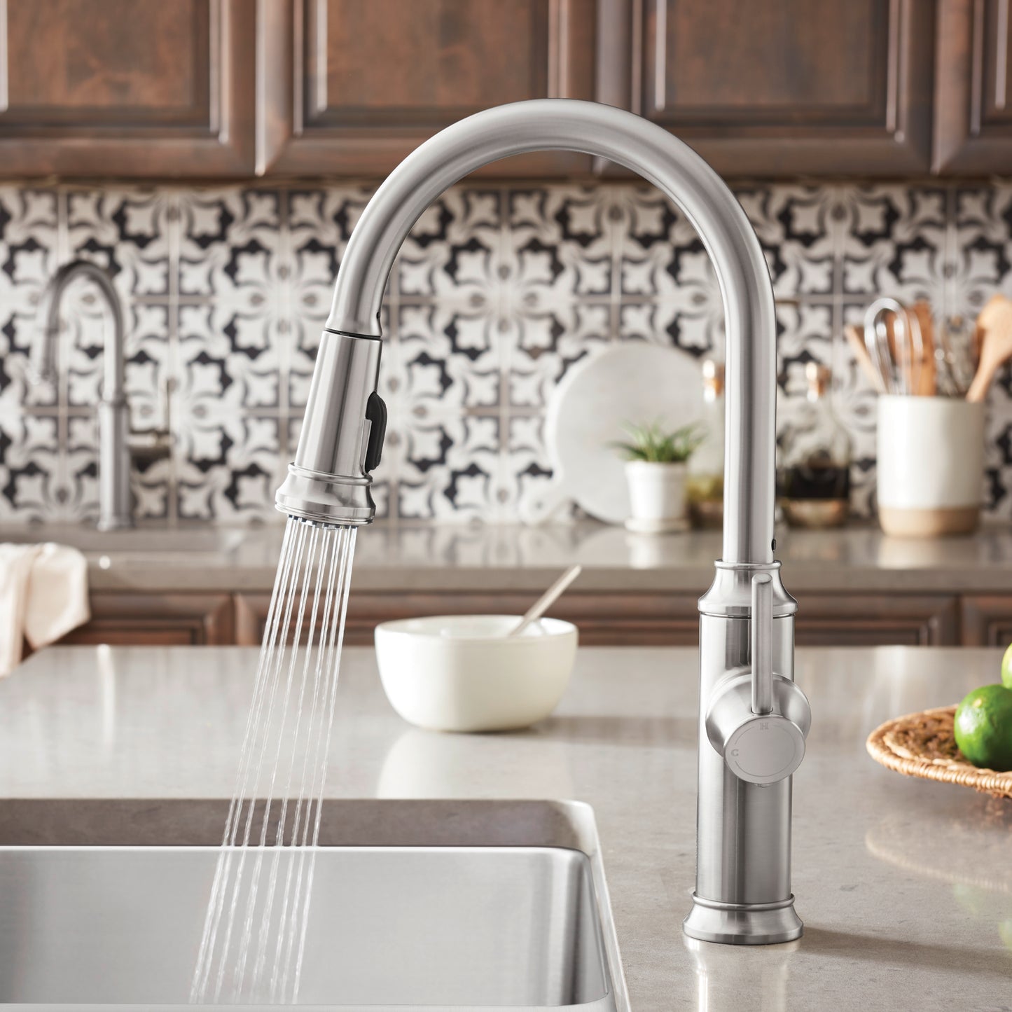 BLANCO Empressa High Arc Pull-Down Dual-Spray Kitchen Faucet in a modern kitchen setting with elegant details.