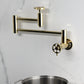 Kingston Brass KS8103RKZ Wendell Wall Mount Pot Filler Faucet with Knurled Handle, Antique Brass
