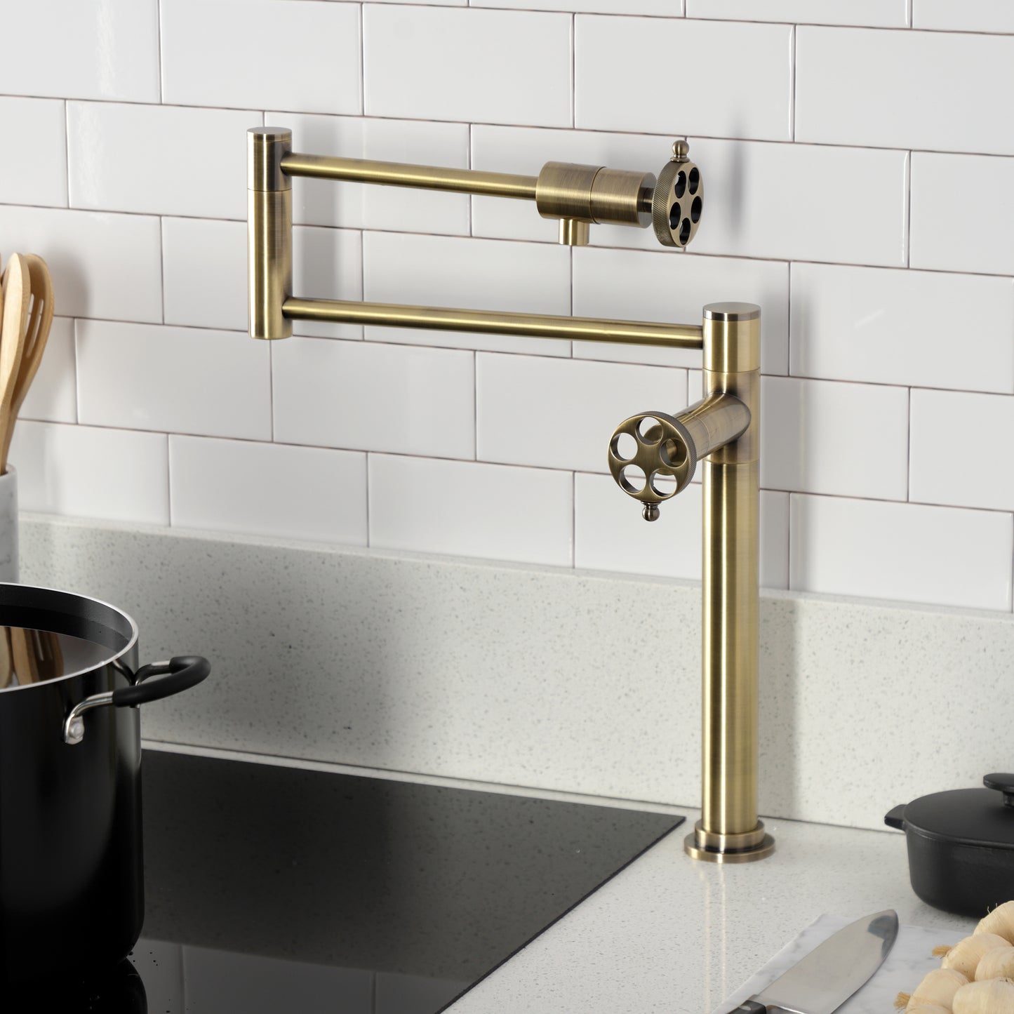 Kingston Brass KS4703RKZ Wendell Deck Mount Pot Filler Faucet with Knurled Handle, Antique Brass on kitchen counter