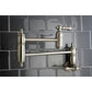 Kingston Brass KS3103AL Restoration Wall Mount Pot Filler Faucet, Antique Brass on a modern tile backsplash.