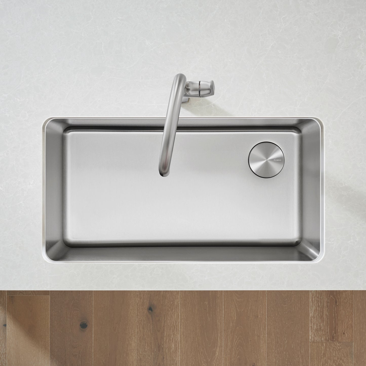 BLANCO Formera 33" Super Single Undermount Stainless Steel Kitchen Sink on a countertop.