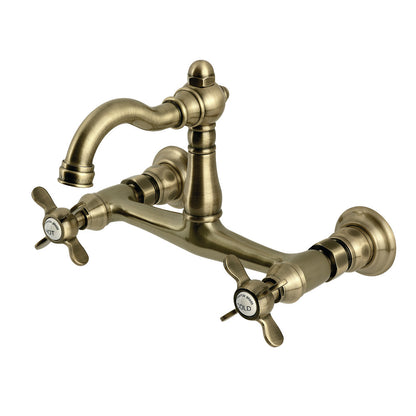 Kingston KS3253BEX Essex Two-Handle Wall Mount Bridge Kitchen Faucet, Antique Brass on white background.