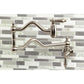 Kingston Brass KS2107AL Heritage Wall Mount Pot Filler Faucet, Brushed Brass on a stylish backsplash.