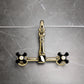 Kingston KS1263PKX Duchess Two-Handle Wall Mount Bridge Kitchen Faucet, Antique Brass with black porcelain handles