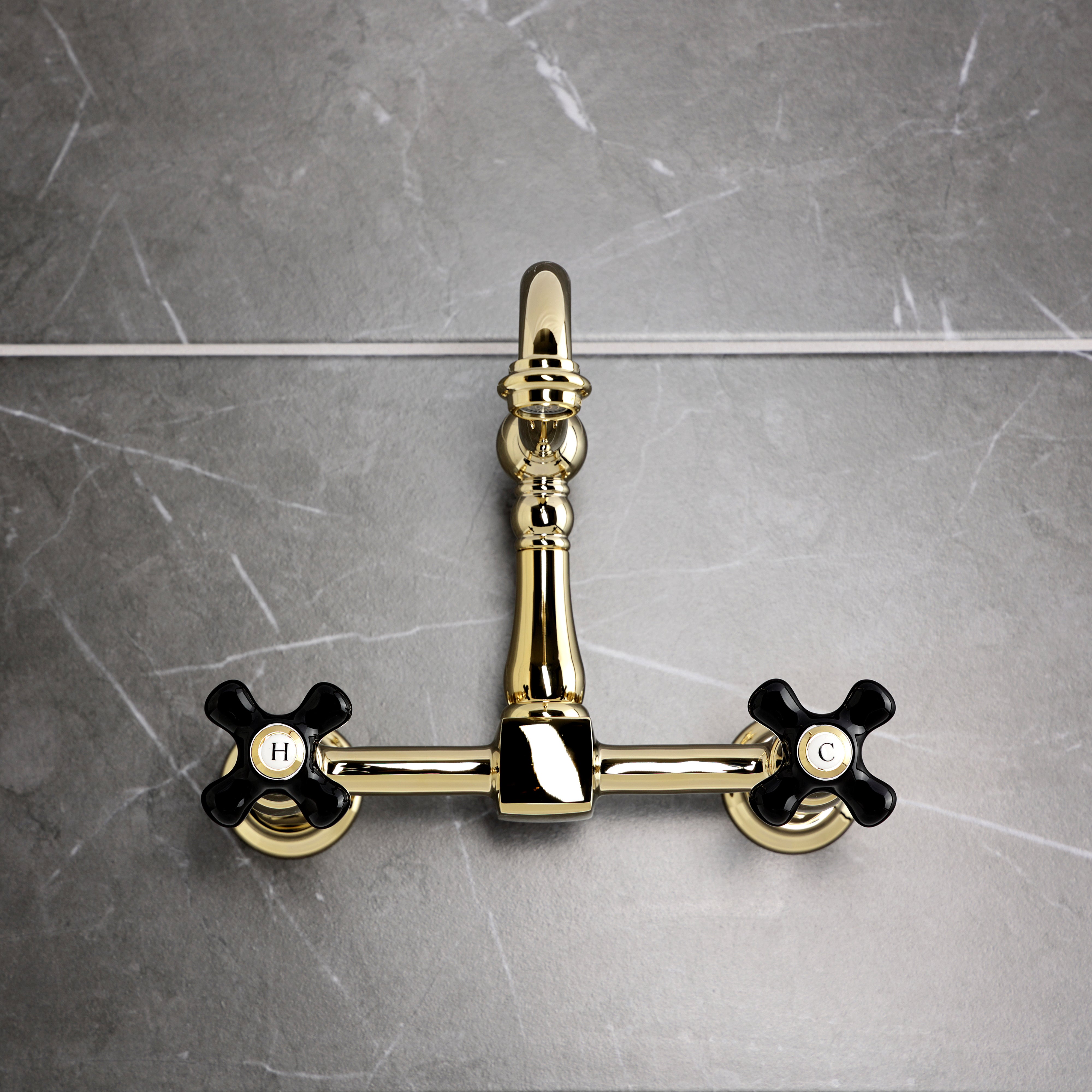 Kingston KS1263PKX Duchess Two-Handle Wall Mount Bridge Kitchen Faucet, Antique Brass with black porcelain handles