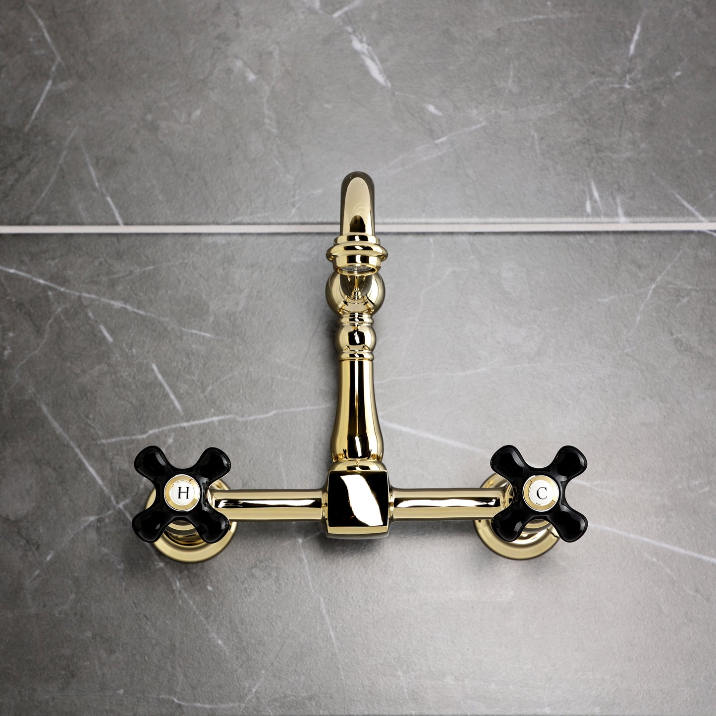 Kingston KS1263PKX Duchess Two-Handle Wall Mount Bridge Kitchen Faucet, Antique Brass with black porcelain handles
