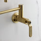 Kingston Brass KS4103KL Whitaker Wall Mount Pot Filler Faucet, Antique Brass close-up of faucet handle