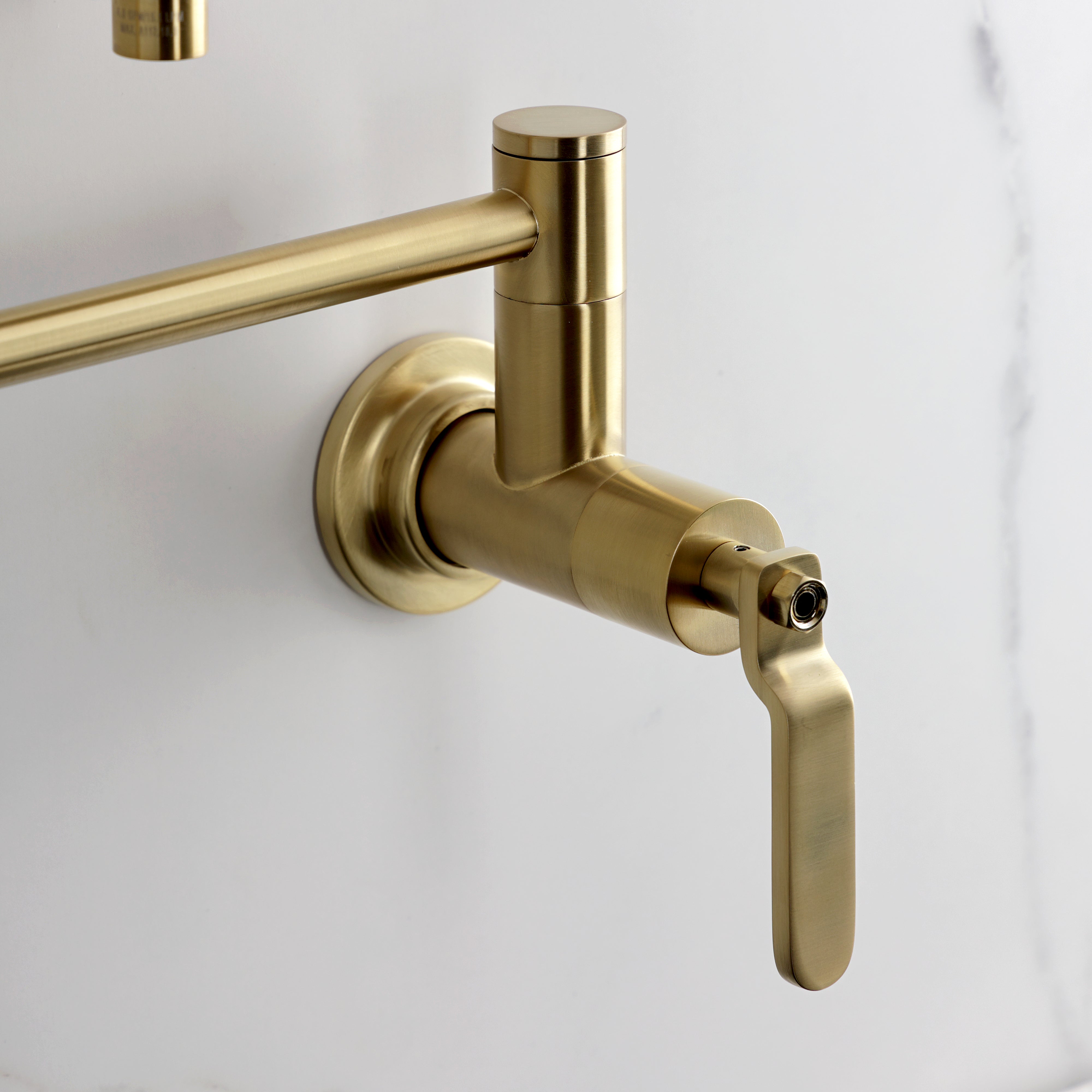 Kingston Brass KS4103KL Whitaker Wall Mount Pot Filler Faucet, Antique Brass close-up of faucet handle