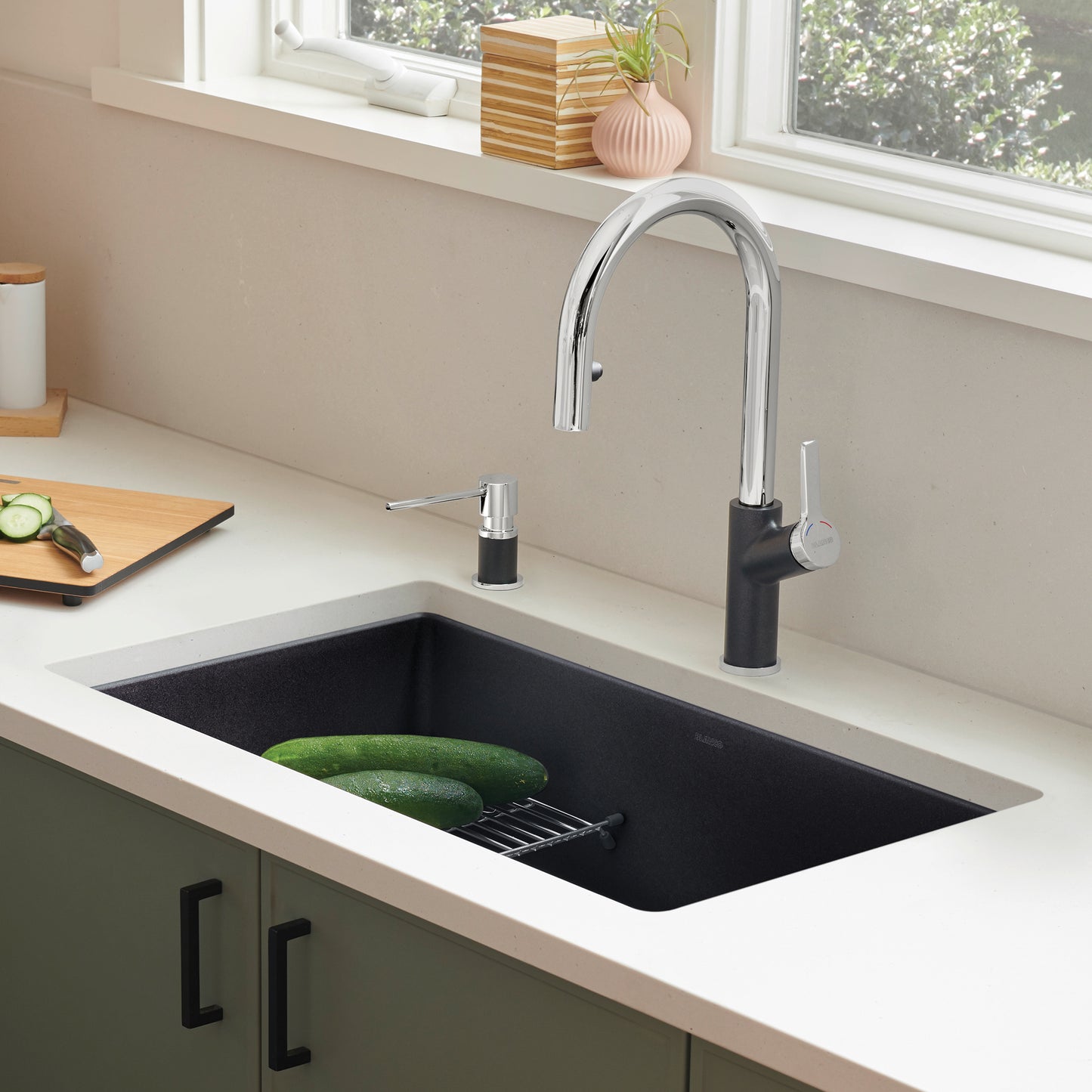 BLANCO Precis SILGRANIT 30" Single Bowl Undermount Kitchen Sink with green cucumbers on counter