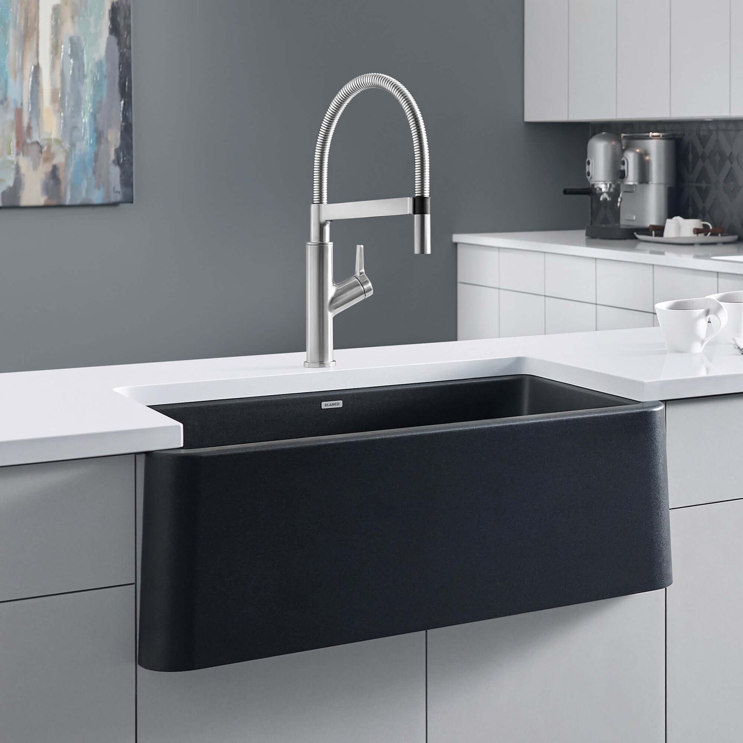 BLANCO Ikon SILGRANIT 33" Single Bowl Apron-Front Farmhouse Sink with modern faucet in contemporary kitchen.
