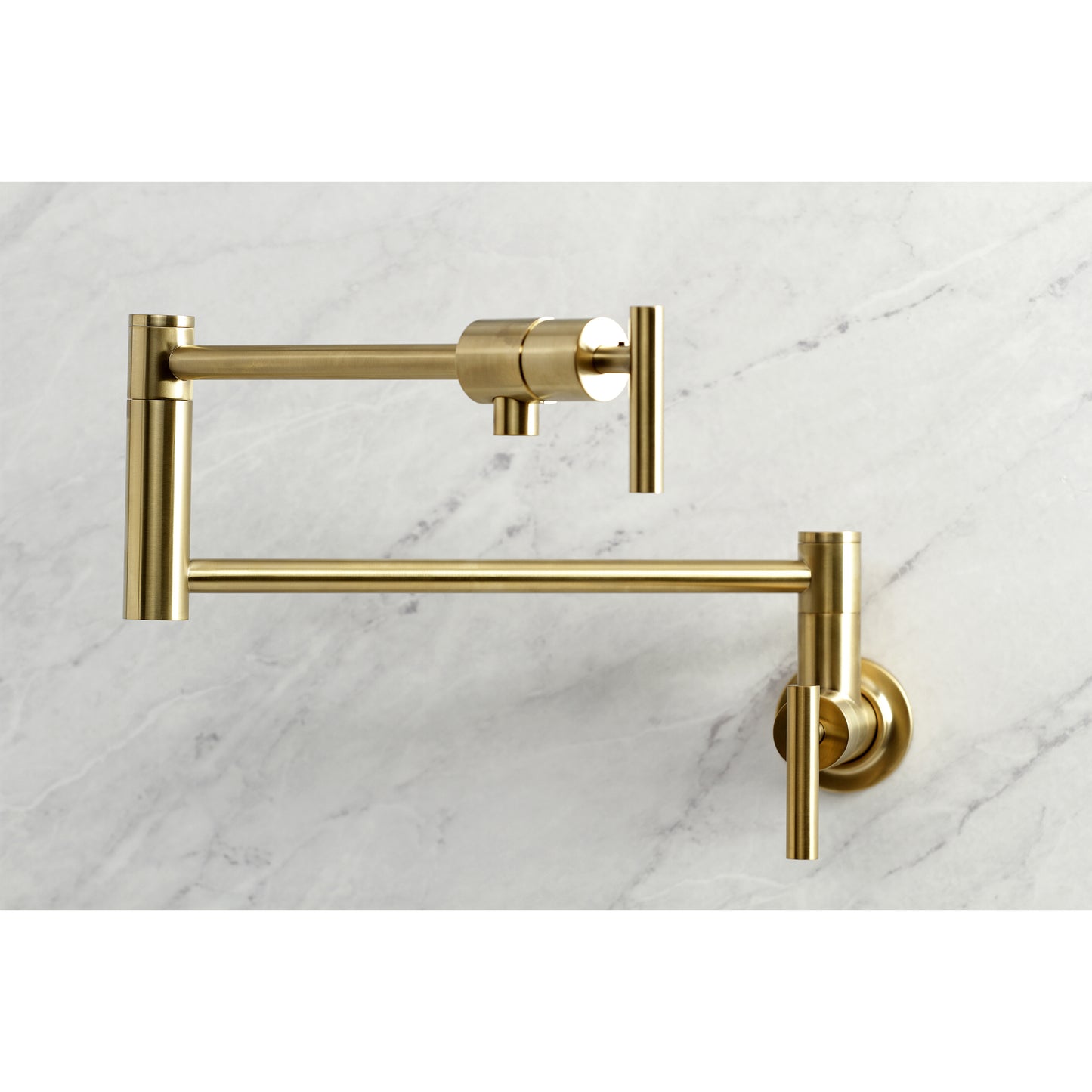 Kingston Brass KS4103CML Manhattan Wall Mount Pot Filler Faucet, Antique Brass on marble background