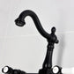 Kingston KS1263BPL Bel-Air Two-Handle Wall Mount Bridge Kitchen Faucet, Antique Brass with black finish and porcelain levers
