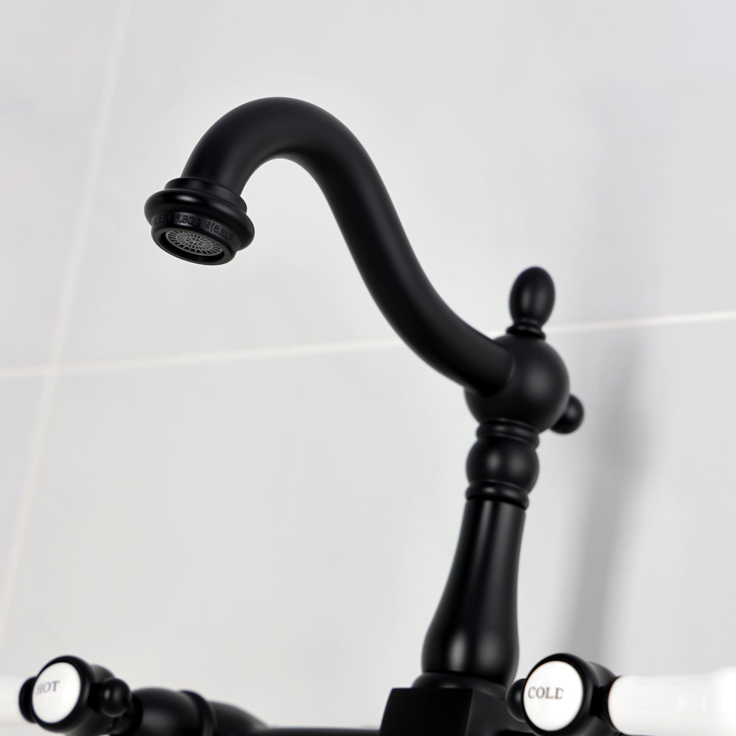 Kingston KS1263BPL Bel-Air Two-Handle Wall Mount Bridge Kitchen Faucet, Antique Brass with black finish and porcelain levers