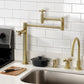 Kingston Brass KS8707ZX Millennium Deck Mount Pot Filler Faucet, Brushed Brass in a stylish kitchen setting.