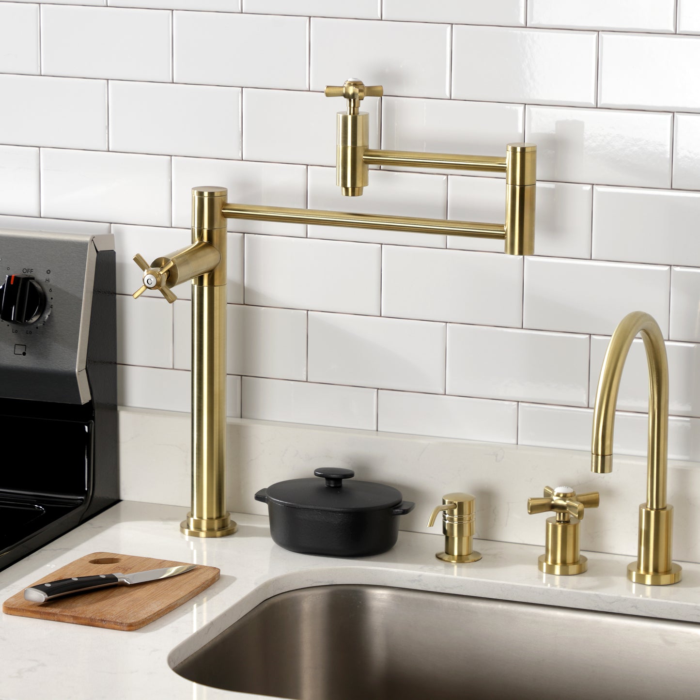 Kingston Brass KS8707ZX Millennium Deck Mount Pot Filler Faucet, Brushed Brass in a stylish kitchen setting.