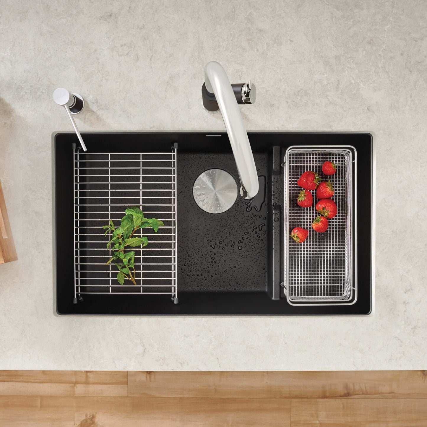 BLANCO Precis Cascade SILGRANIT 29" Single Bowl Undermount Kitchen Sink with Colander featuring fresh strawberries and mint.