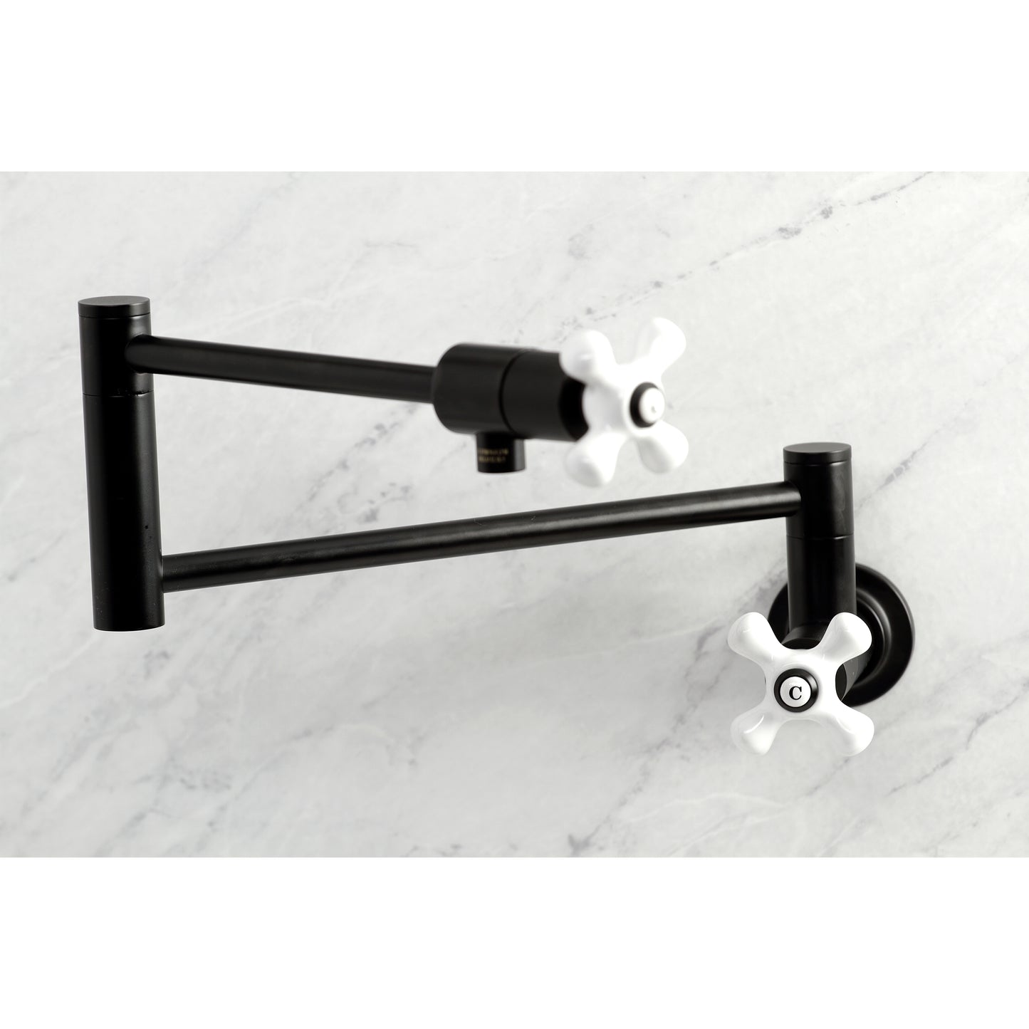 Kingston Brass KS4107PX Metropolitan Wall Mount Pot Filler Faucet, Brushed Brass, featuring swing arms and white knobs.