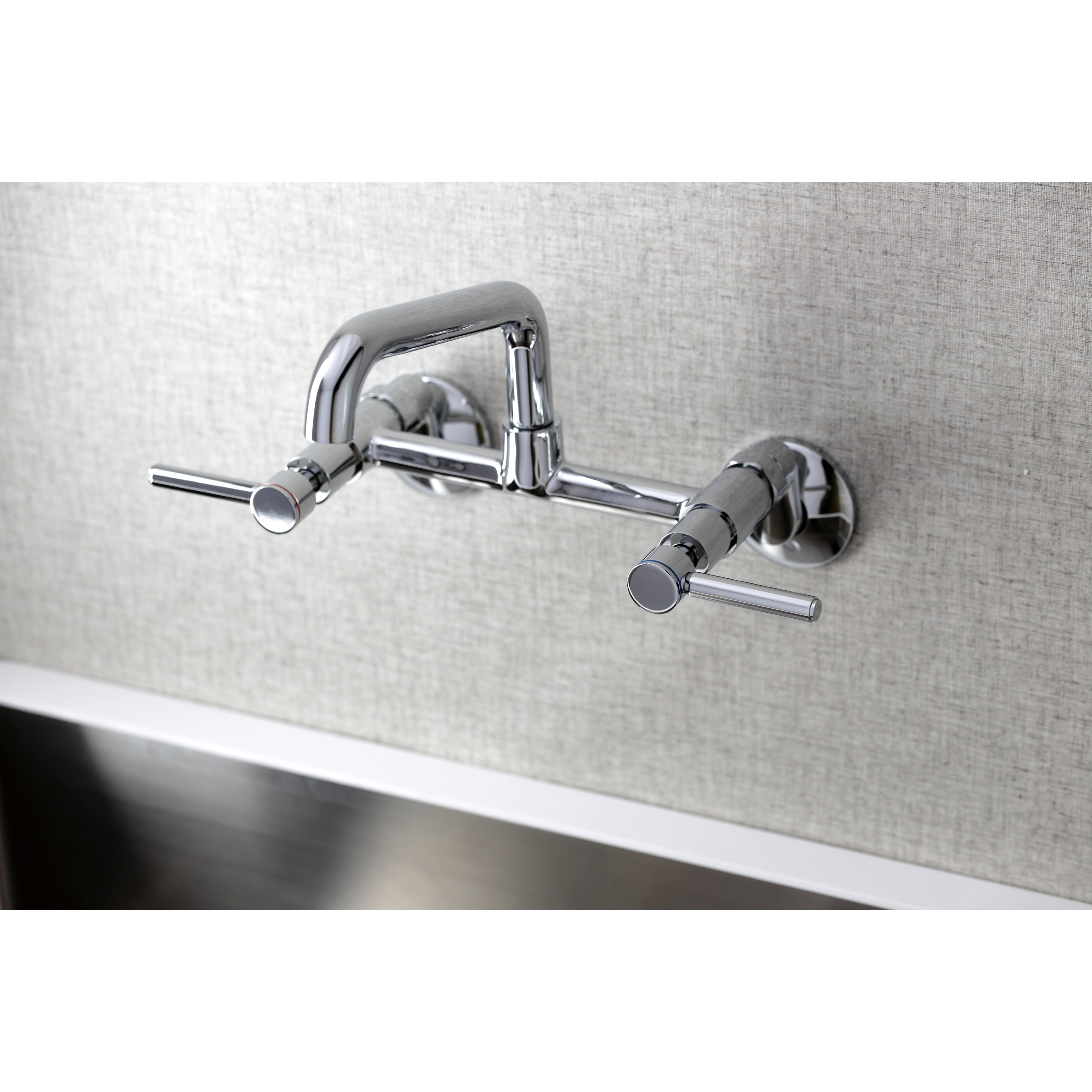 Kingston Brass KS823SB Concord Wall Mount Bridge Kitchen Faucet with chrome finish and modern design.