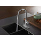 Gourmetier LS2723DKL Kaiser Single-Handle Pull-Down Kitchen Faucet, Brushed Brass in sleek kitchen setting.