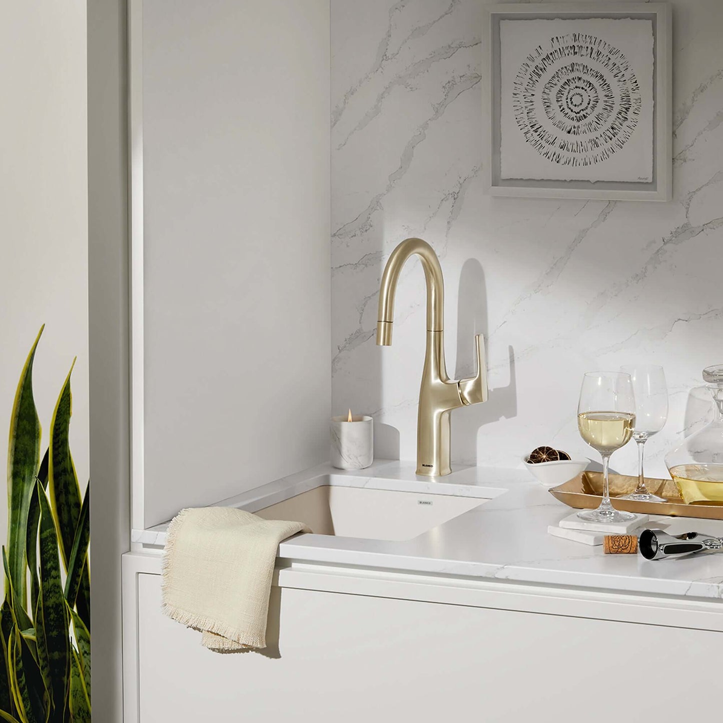 Modern kitchen setting featuring BLANCO Precis SILGRANIT 13" Undermount Bar Sink with stylish faucet and elegant decor.