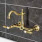 Kingston KS1263BAL Heirloom Two-Handle Wall Mount Bridge Kitchen Faucet, Antique Brass on a marble background