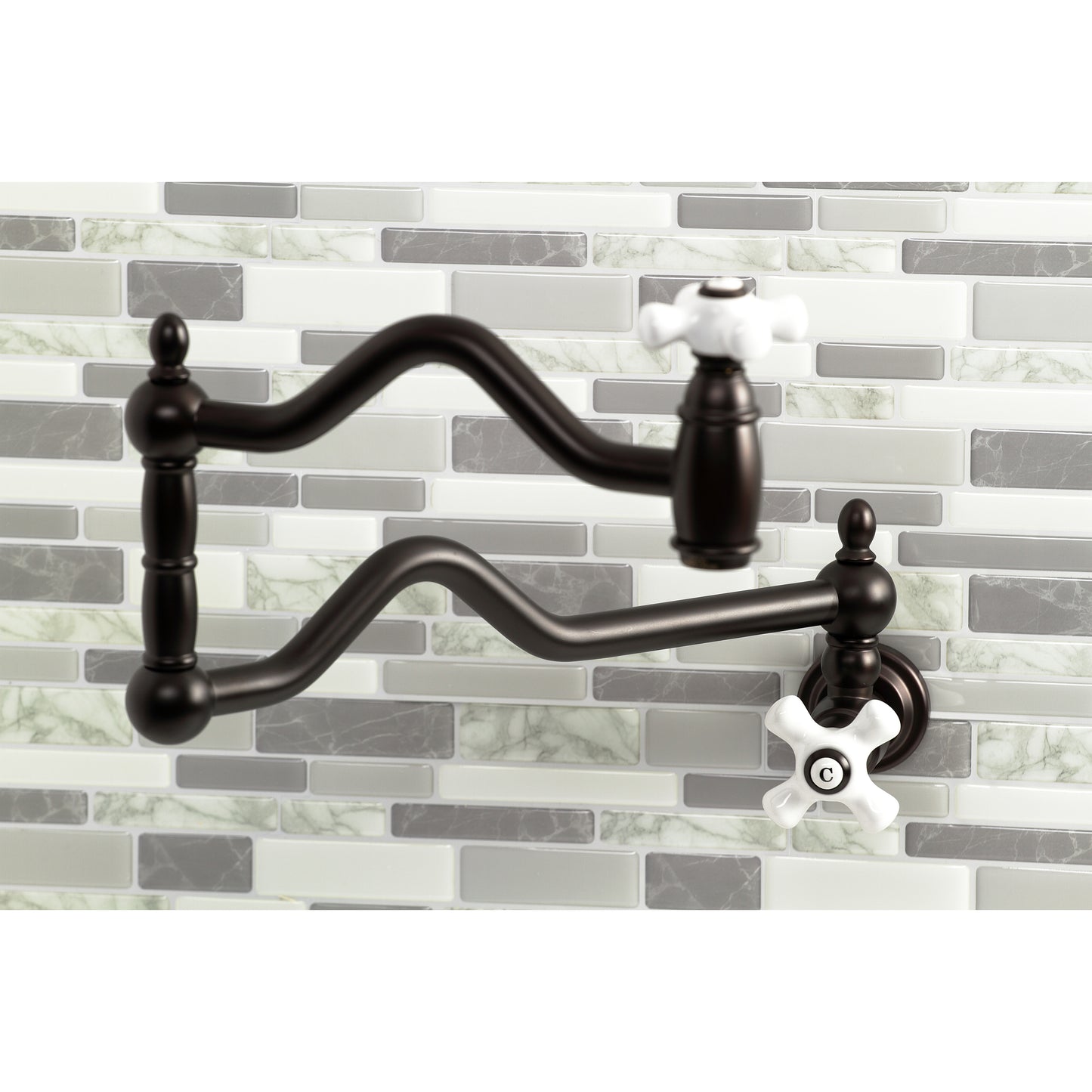 Kingston Brass KS2107PX Heritage Wall Mount Pot Filler Faucet, Brushed Brass on stylish backsplash.