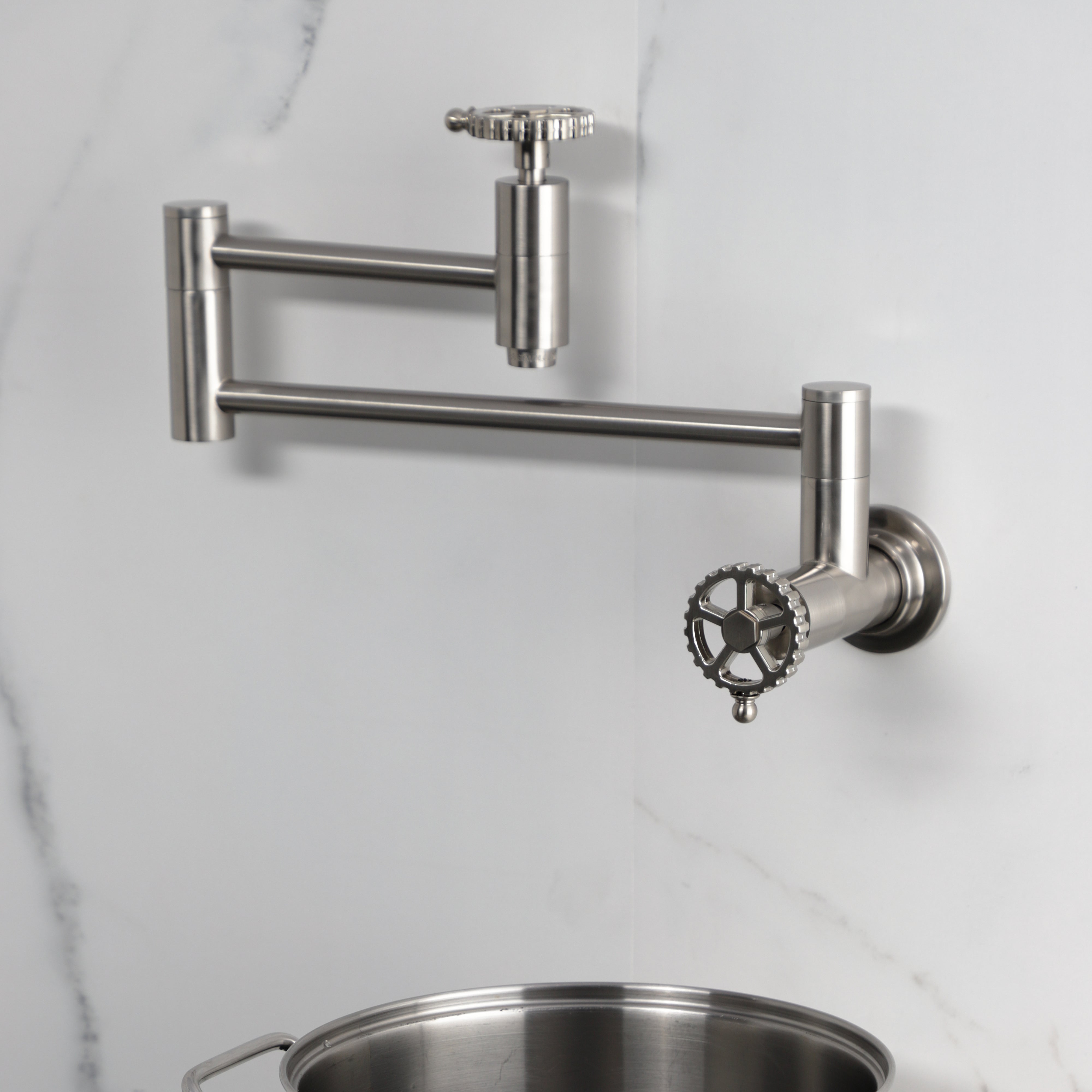 Kingston Brass KS8103CG Fuller Wall Mount Pot Filler Faucet, Antique Brass design with foldable swing arms.