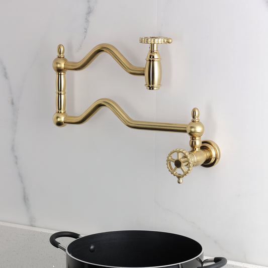 Kingston Brass KS2107CG Fuller Wall Mount Pot Filler Faucet, Brushed Brass mounted above a pot on a countertop.